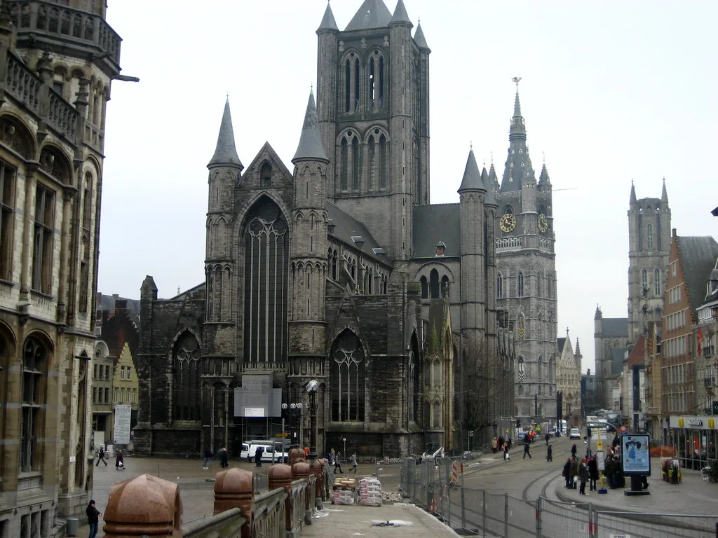 Saint Nicholas' Church with the belfry rising behind it in central Ghent.