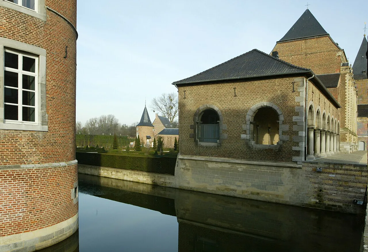 A brick pavilion beside the moat at Alden Biesen, Bilzen.