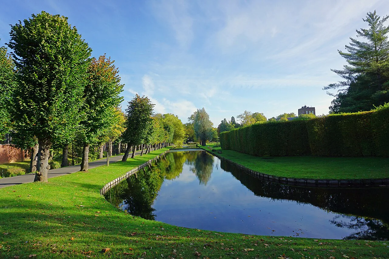 A tree-lined moat in Arenberg Castle park, Heverlee, Leuven.