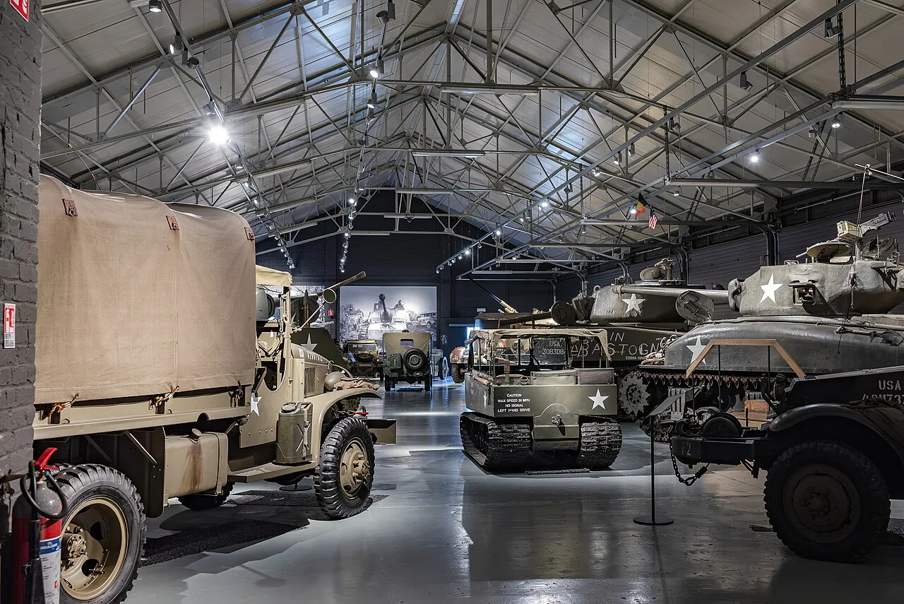 Military vehicles in the display hangar at Bastogne Barracks, Bastogne.