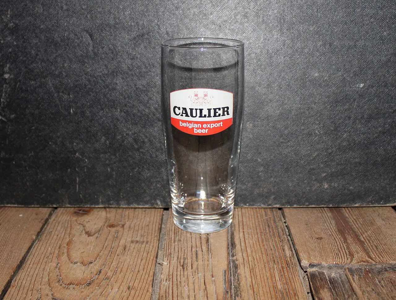 A branded Caulier beer glass.