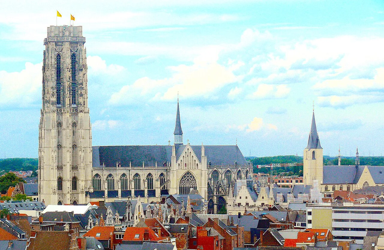 St Rumbold's Cathedral and its tower seen across the rooftops of Mechelen.