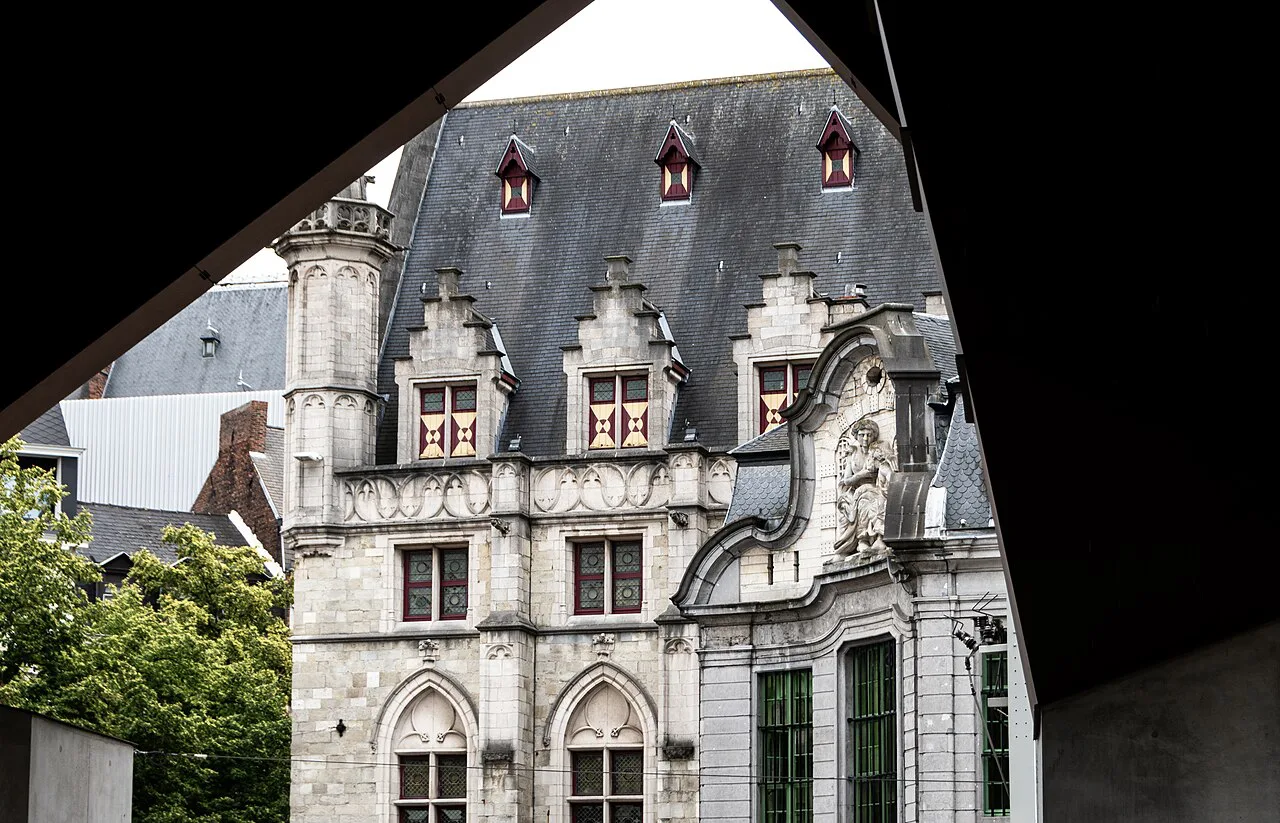 Ghent's Cloth Hall framed by the canopy of the Stadshal, Ghent.