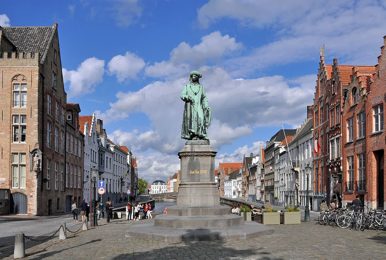 The statue of Jan van Eyck on Jan van Eyckplein in Bruges.