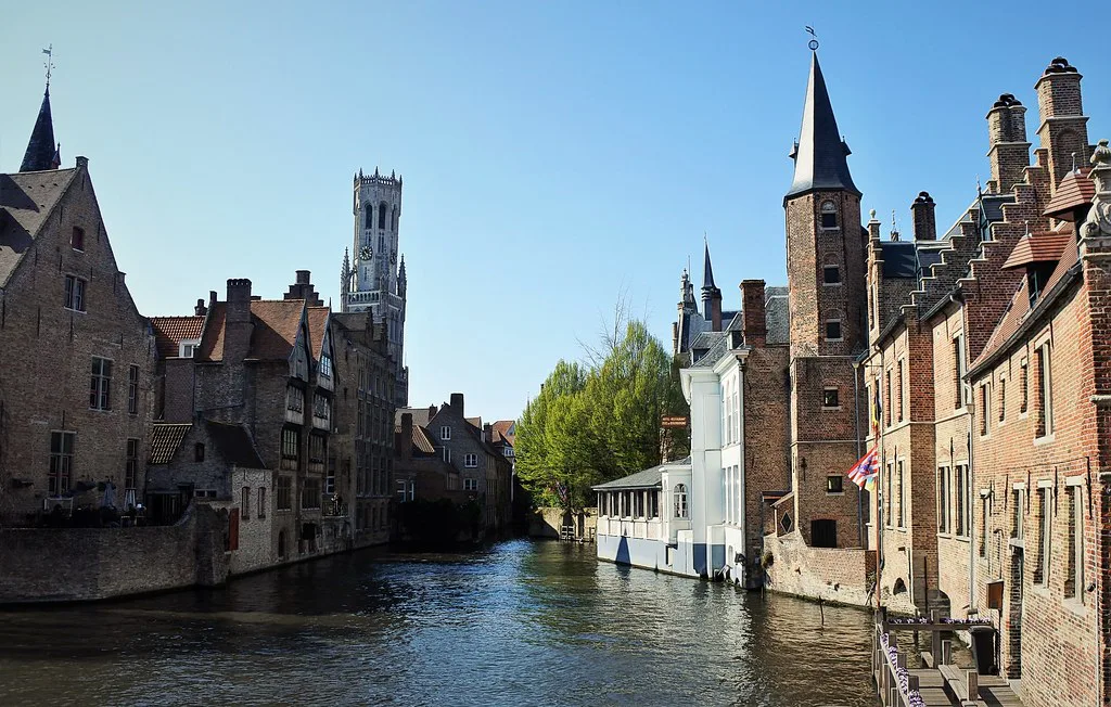 The Belfry of Bruges seen across the canal from the Rozenhoedkaai.