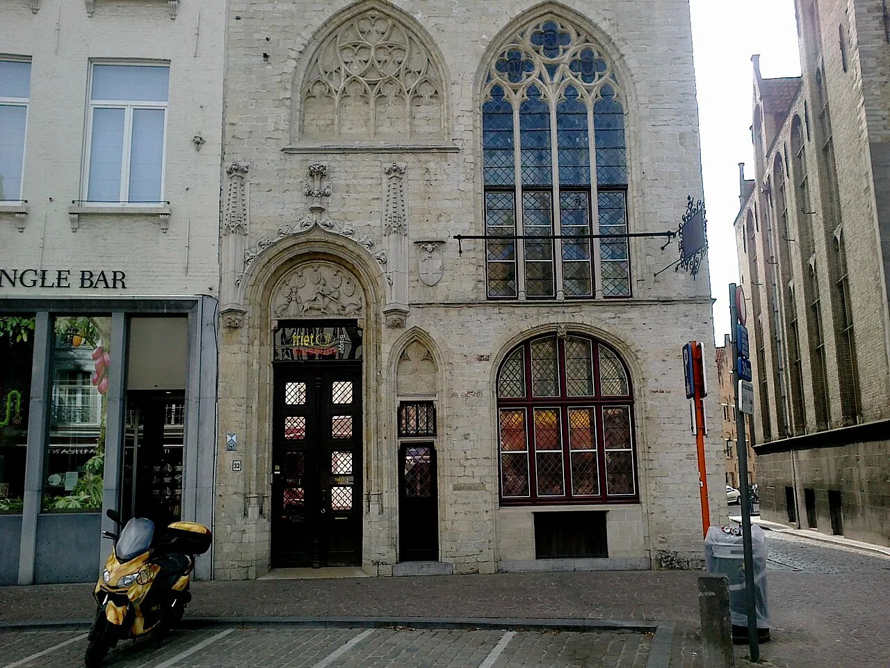 The Gothic façade of the building housing the Friet Museum, Bruges.