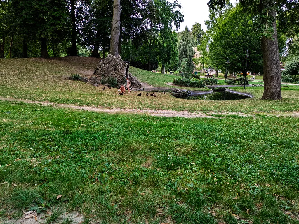 Lawns and trees in a park in Leuven.