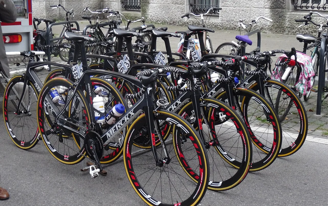 Racing bikes lined up at the start of a race in Leuven.