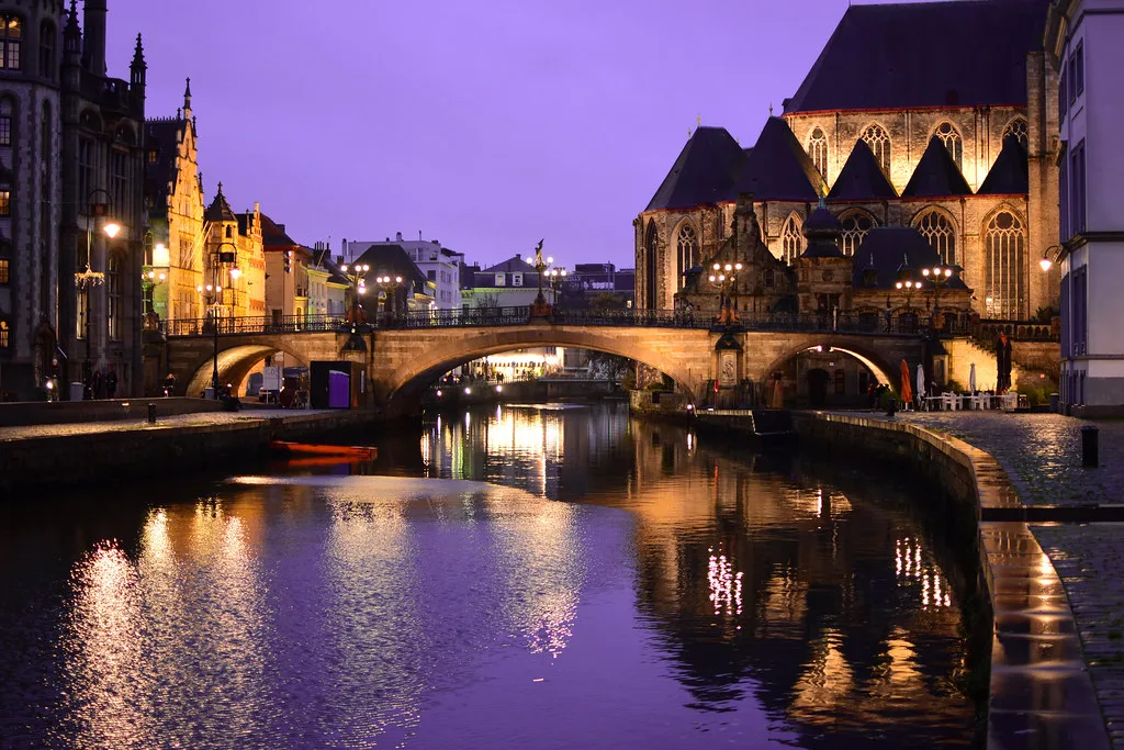 St Michael's Bridge and the River Leie at dusk in central Ghent.