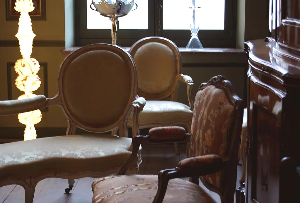 Period chairs in an eighteenth-century room of the Design Museum Gent.