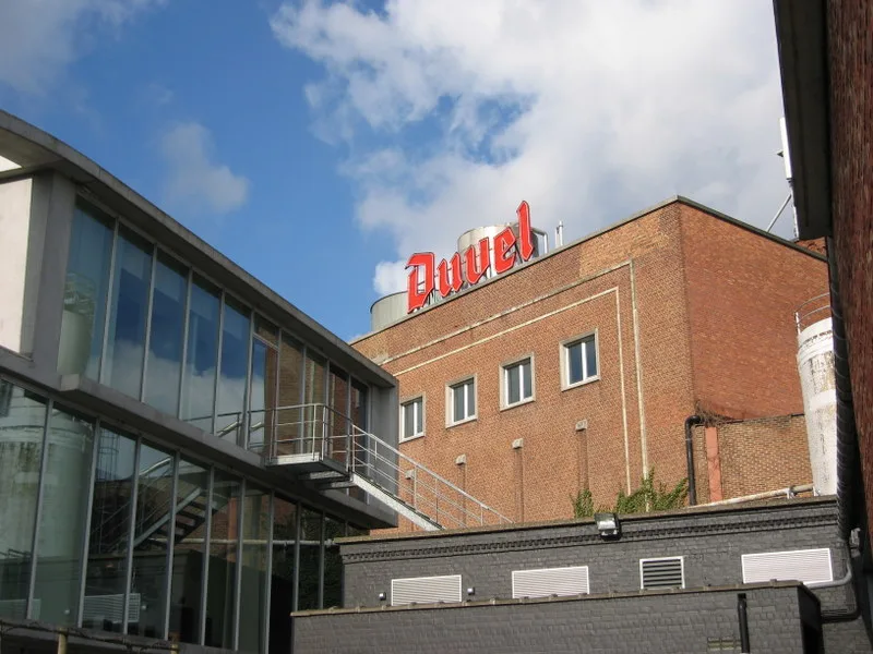 The Duvel Moortgat brewery building with its Duvel sign.