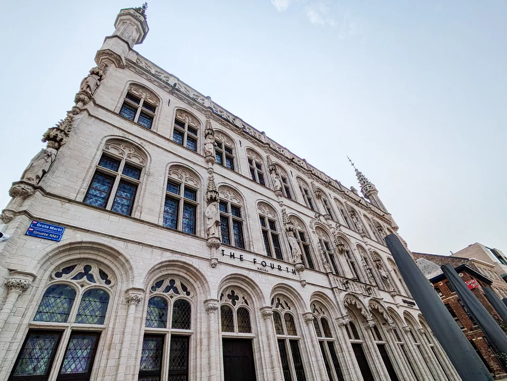 An ornate Gothic façade in central Leuven.