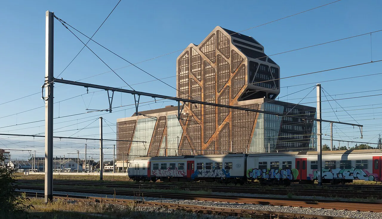 Hasselt's modern courthouse seen across the railway tracks.