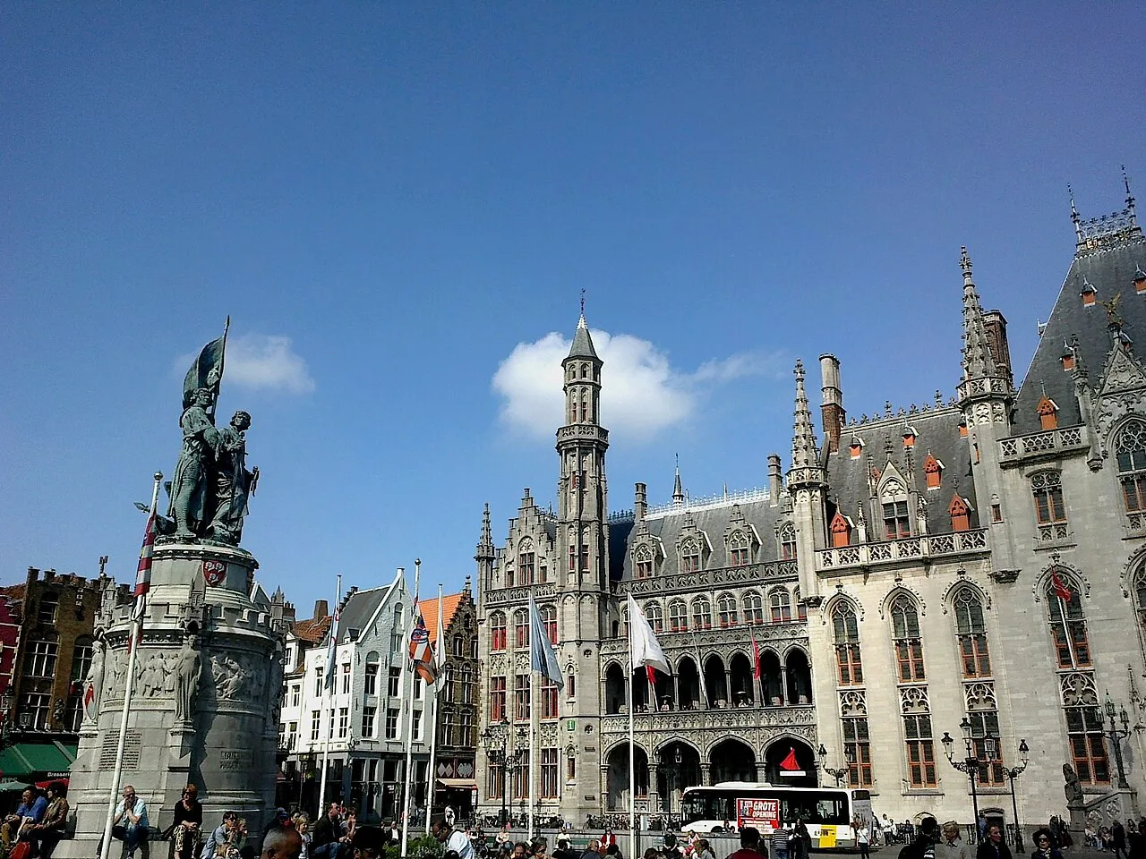 The Markt with the statue of Jan Breydel and Pieter de Coninck and the Provincial Court, near the Historium, Bruges.