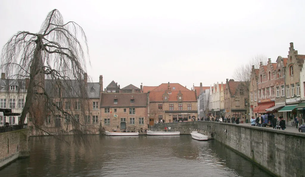 The Rozenhoedkaai canal and its gabled houses in central Bruges.