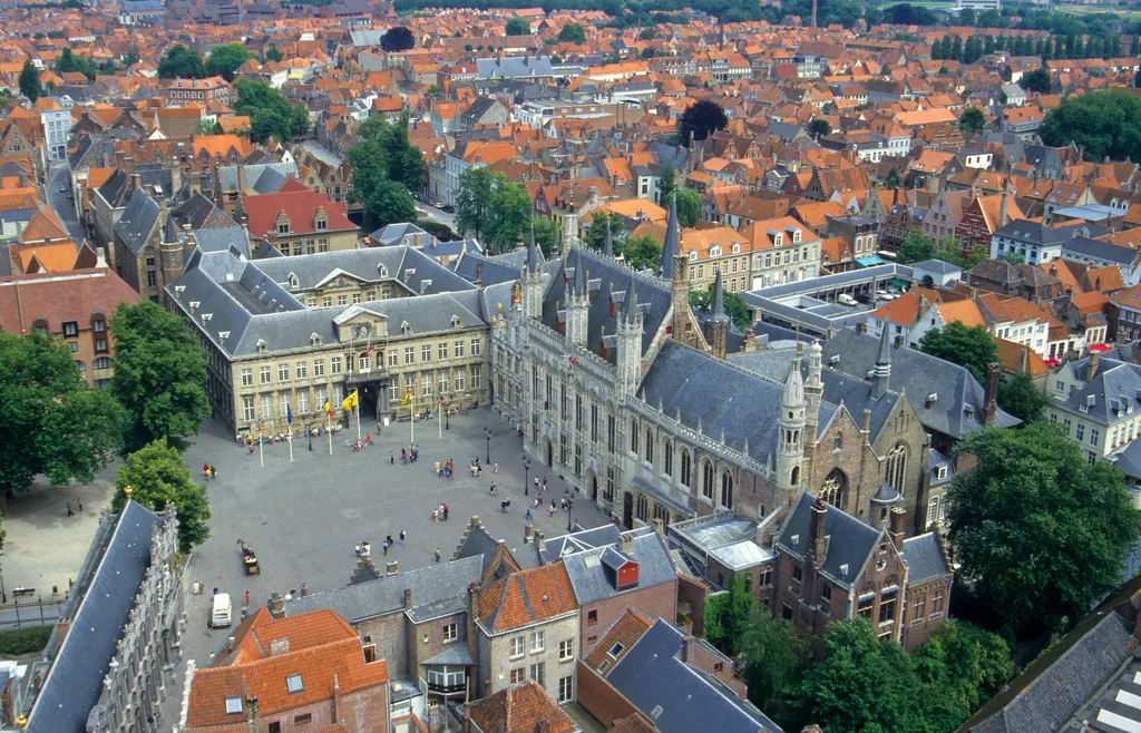 The Burg square and the rooftops of Bruges seen from above.