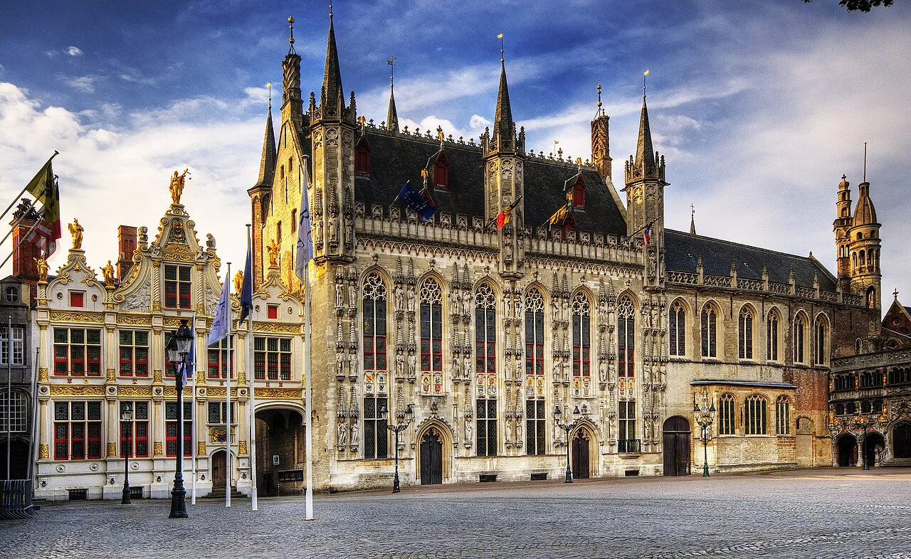 The Gothic façade of Bruges Town Hall on the Burg.