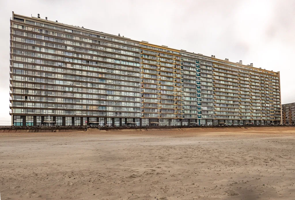 A long block of seafront flats above the beach, Ostend.