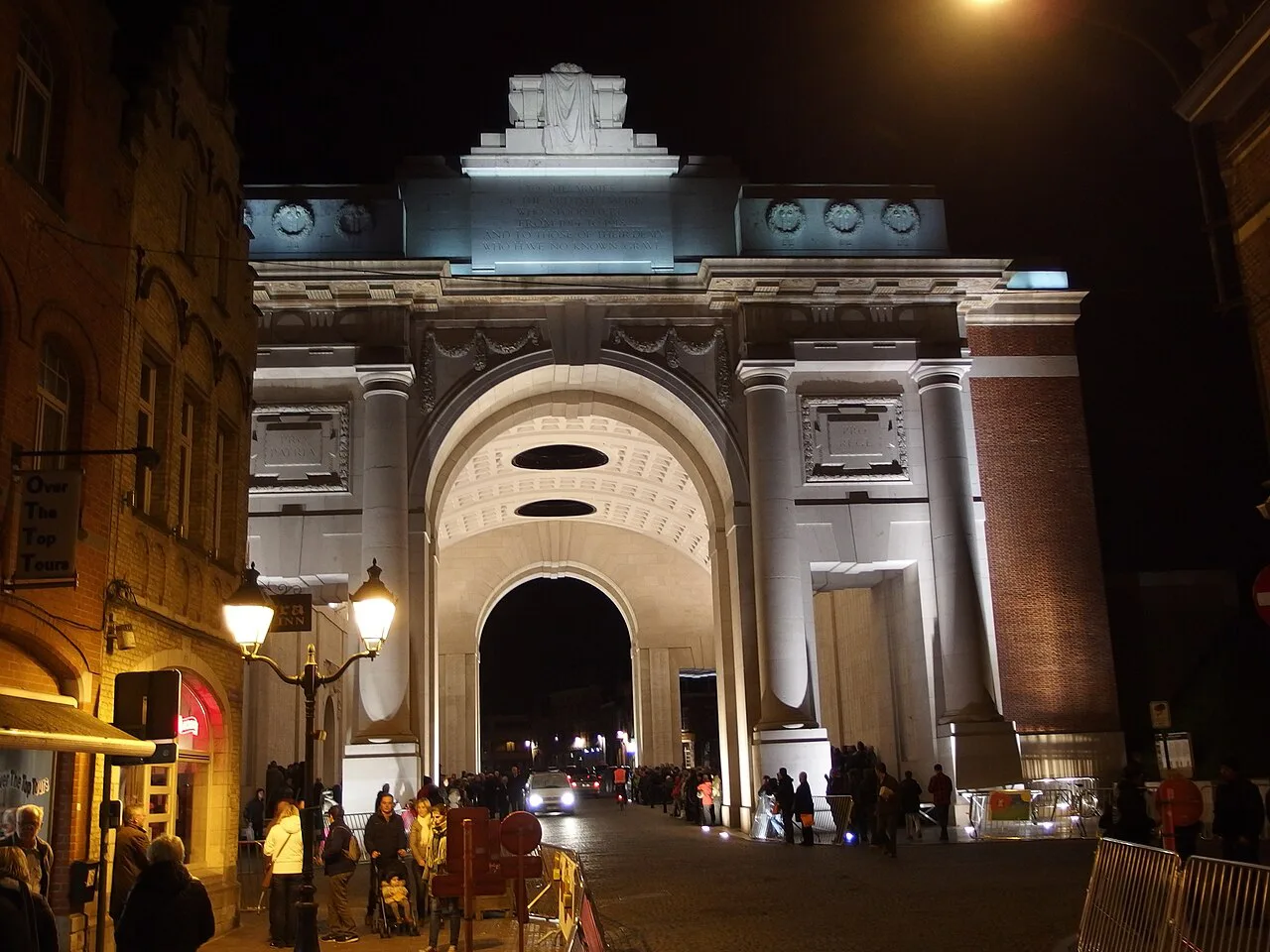 The Menin Gate lit up at night in Ypres.