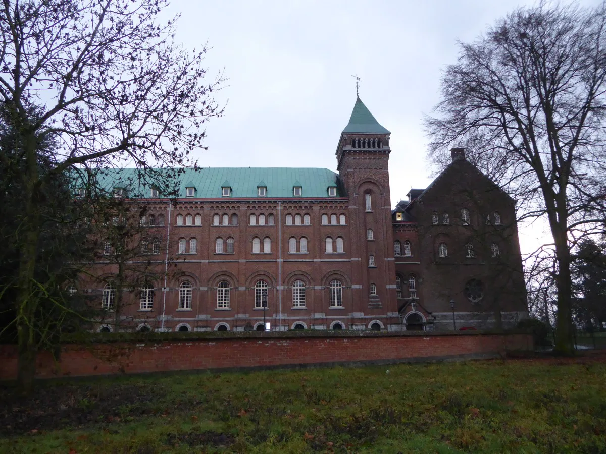 The brick buildings of Keizersberg Abbey on its hill, Leuven.