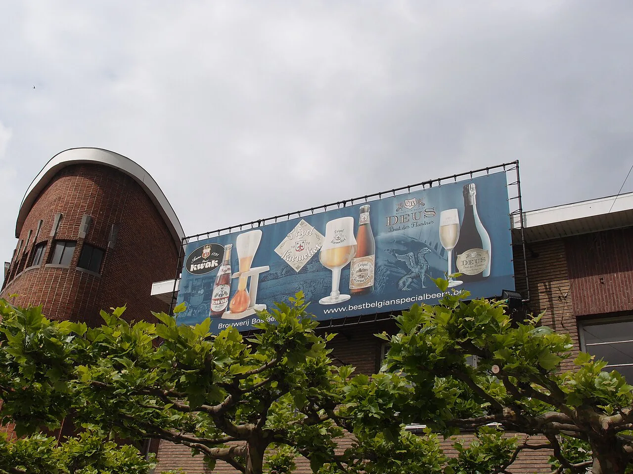 The Bosteels brewery building with its beer billboard, Buggenhout.