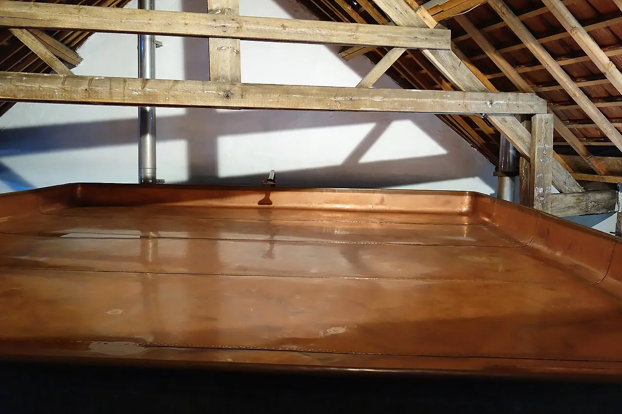 The copper coolship under the roof of the Cantillon brewery, Brussels.