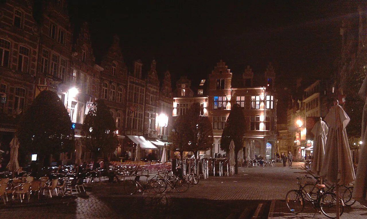 The gabled houses and café terraces of the Oude Markt at night, Leuven.