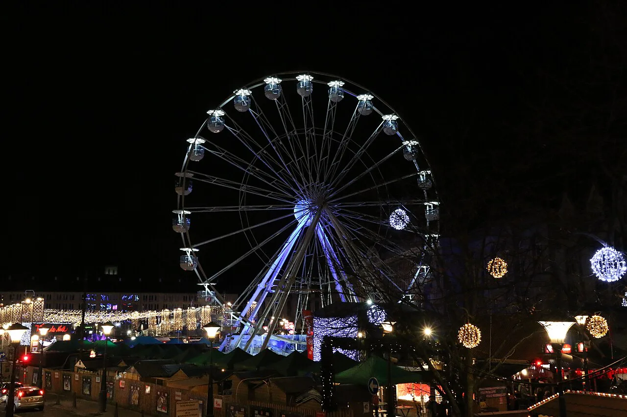 A Ferris wheel lit up at the Christmas market in Liège.