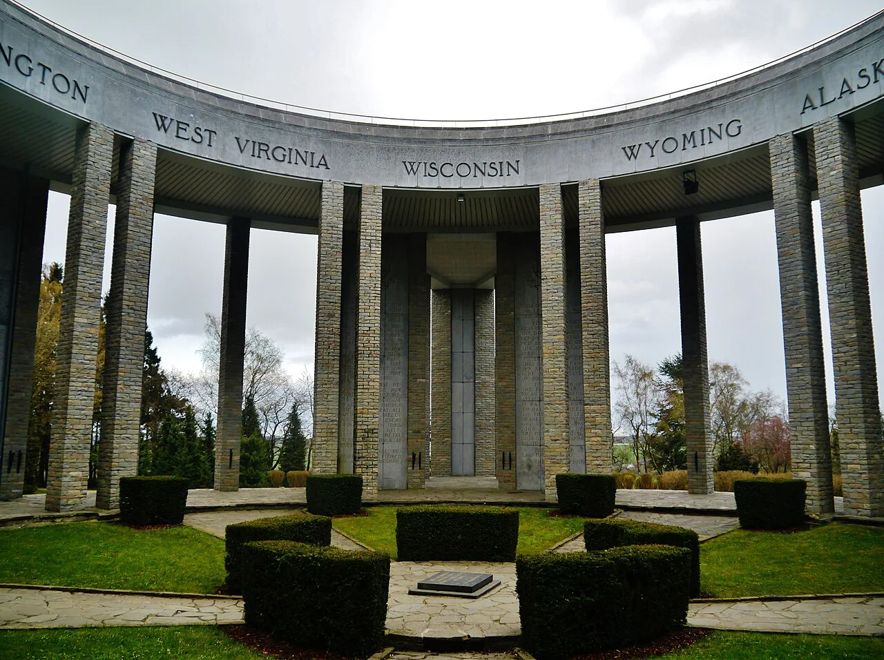 The colonnade of the Mardasson Memorial inscribed with the names of US states, Bastogne.