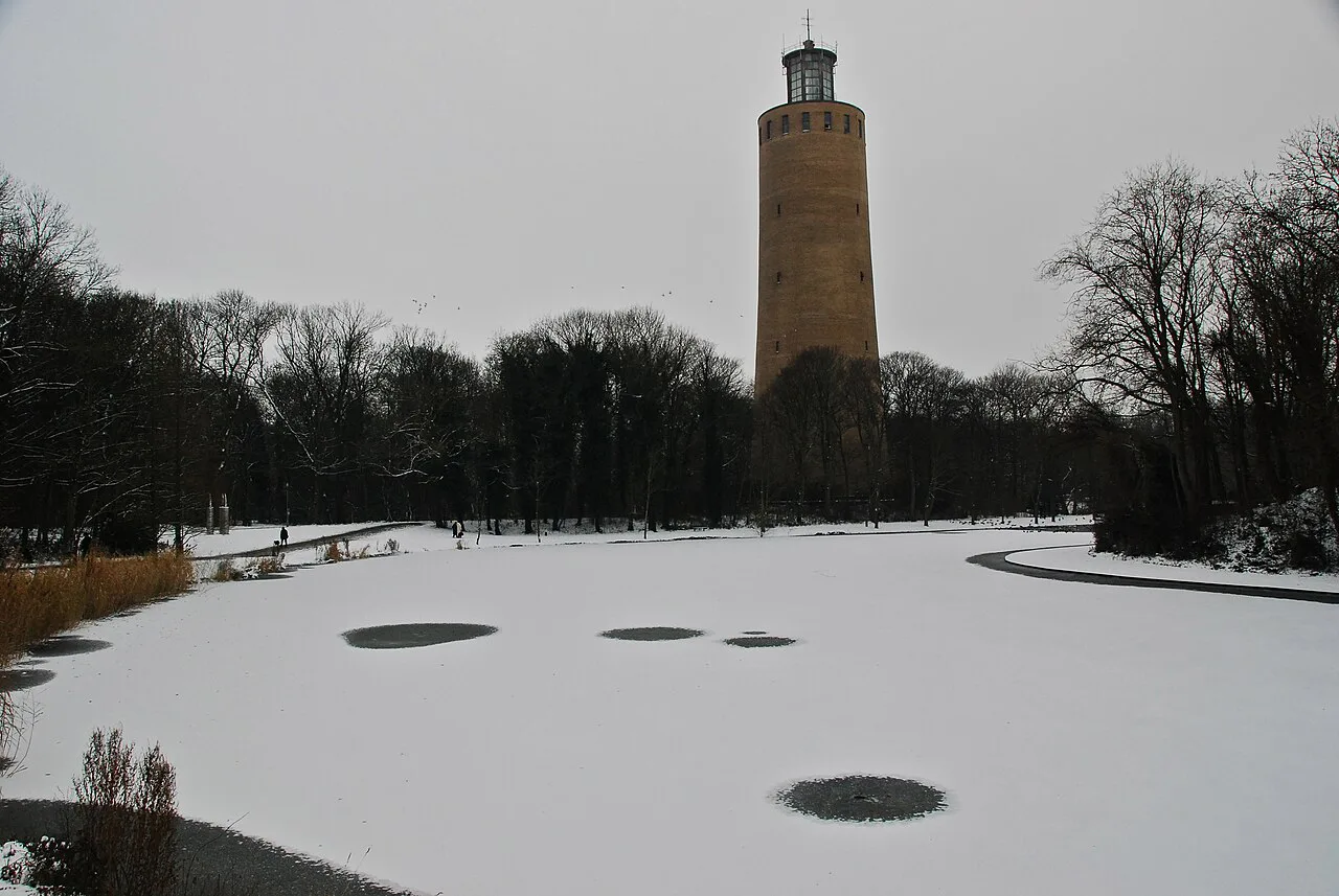 The water tower above a frozen pond in Maria Hendrikapark, Ostend.