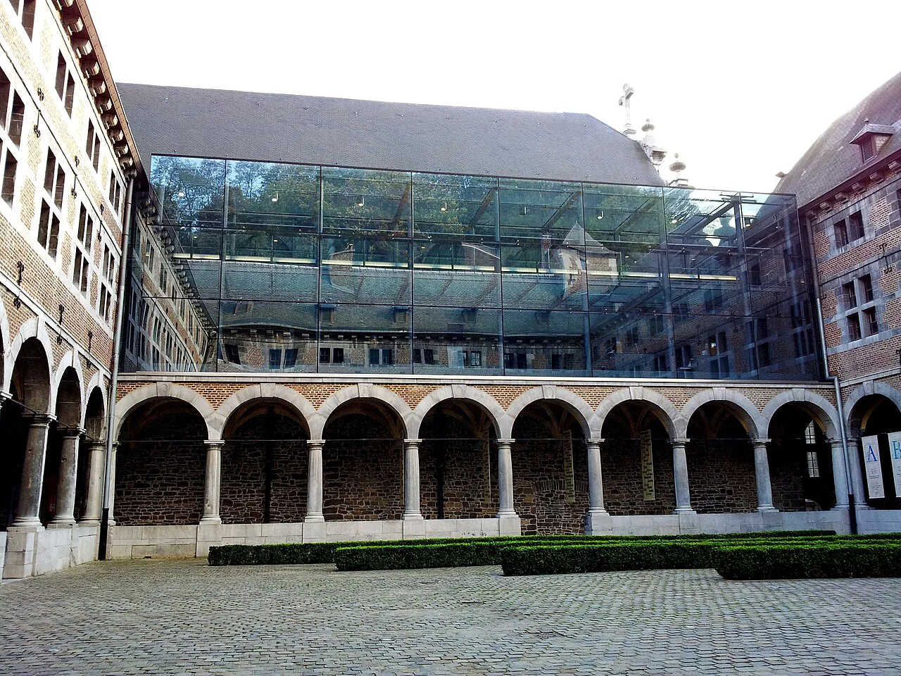 The arcaded Cour des Mineurs cloister of the Musée de la Vie wallonne, Liège.