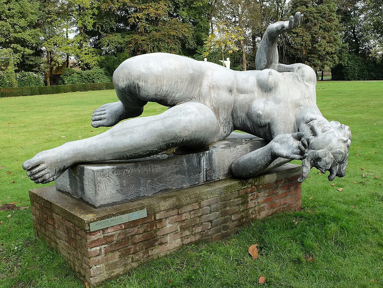 A reclining bronze by Aristide Maillol in the Middelheim sculpture park, Antwerp.