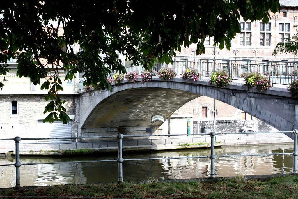 A stone bridge over the water in Namur.