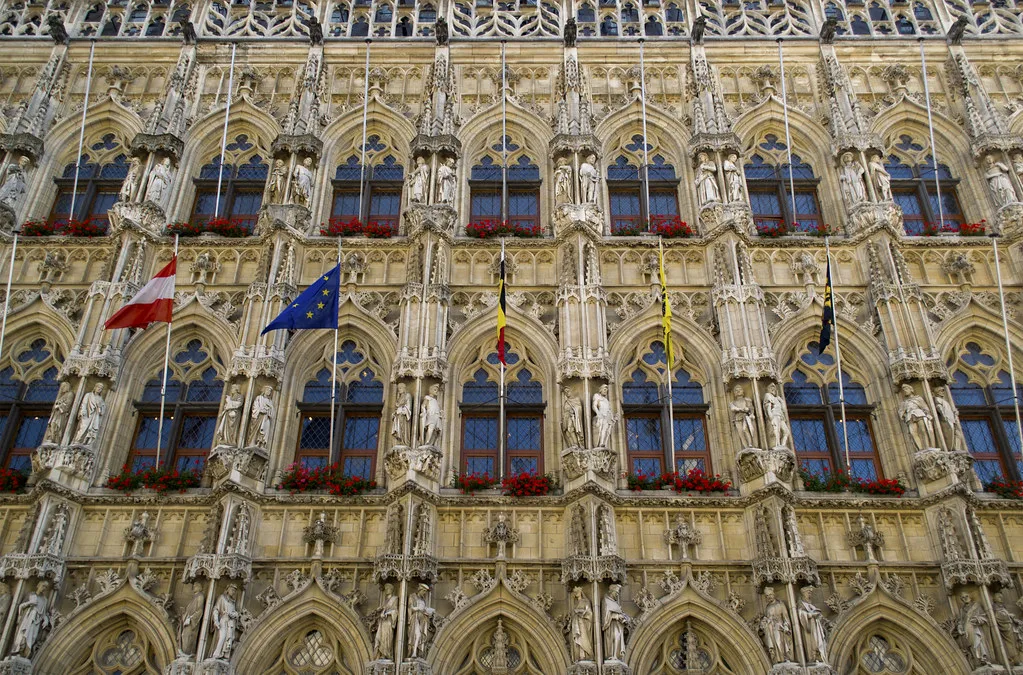 The richly carved façade of Leuven Town Hall.
