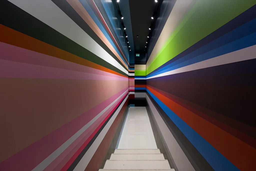 A colour-striped stairway installation inside the KMSKA in Antwerp's Het Zuid.