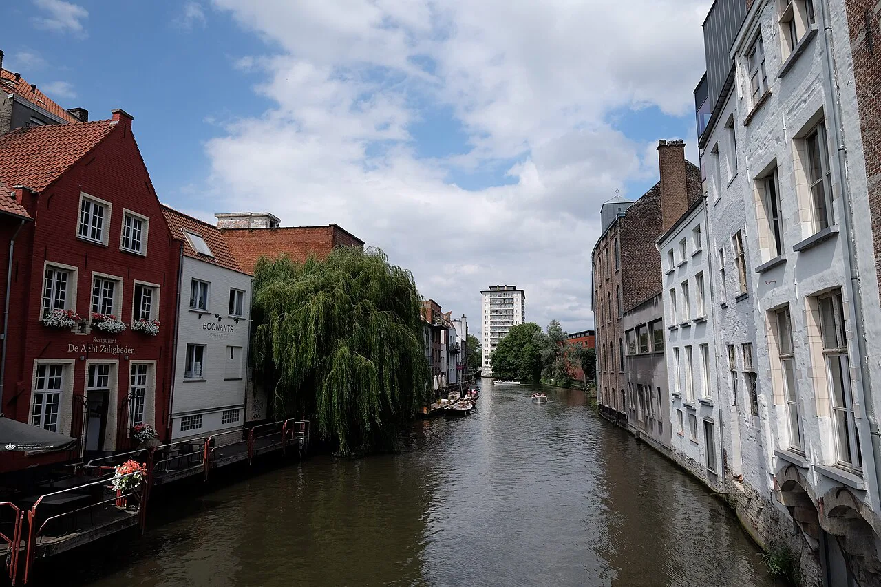 Brick and gabled houses lining a canal in Ghent.
