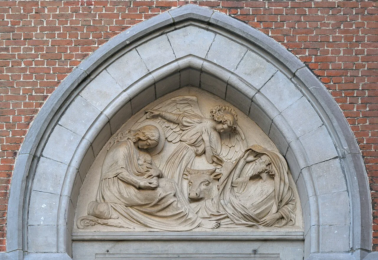 A Nativity carving above the left portal of Sint-Jozefskerk, Ostend.