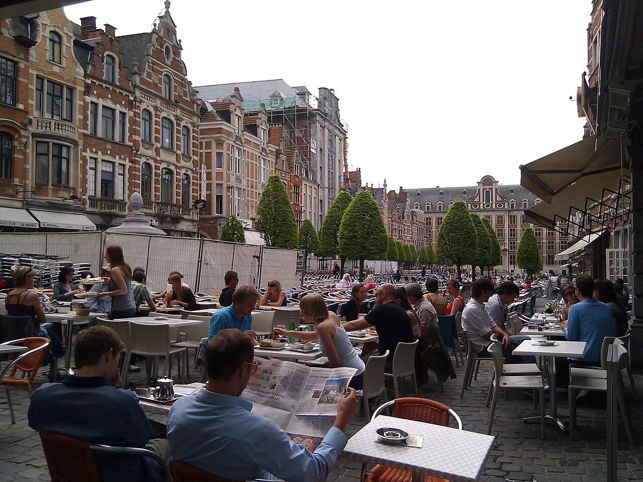 Café terraces lining the Oude Markt in Leuven.