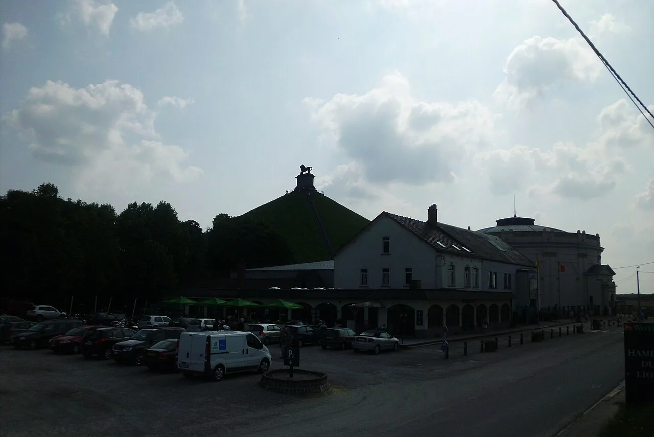 The Lion's Mound rising behind the visitor buildings and the Panorama rotunda at Waterloo.