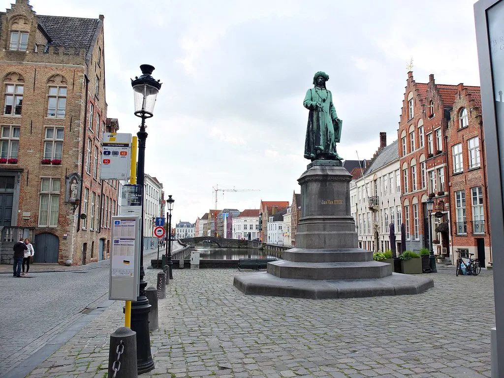 The statue of Jan van Eyck on Jan van Eyck Square in Bruges.