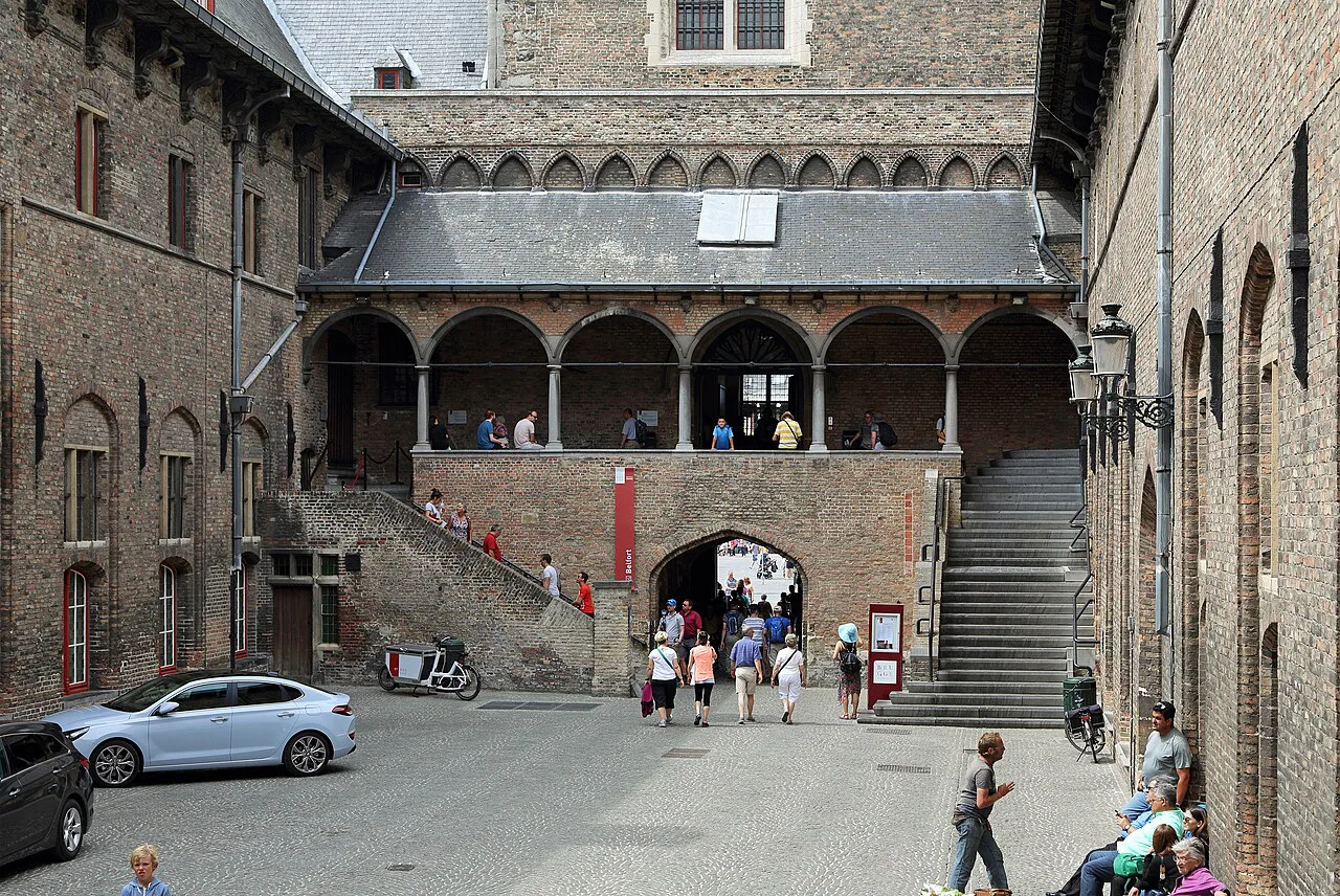 The arcaded inner courtyard of the Halle beneath the Belfry, Bruges.