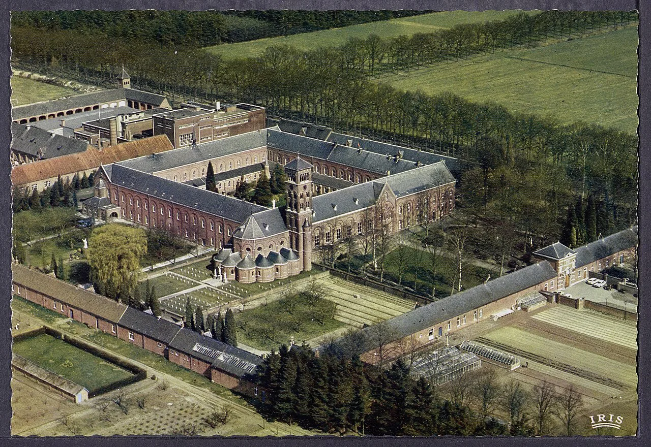 Westmalle Abbey and its farmland from the air, on an early printed postcard.