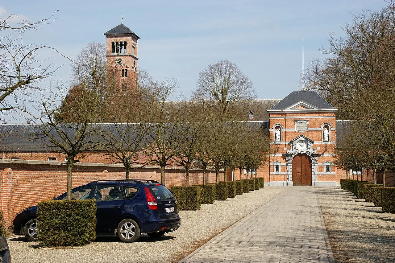 The entrance to Westmalle Abbey, with its campanile behind.