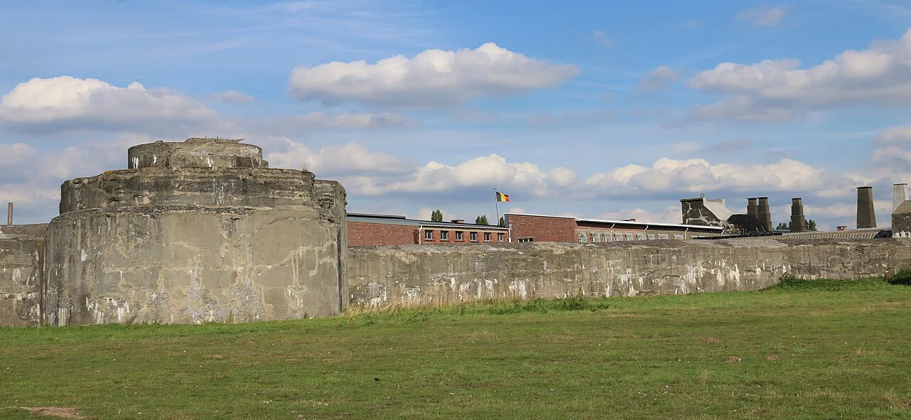 The earth-covered walls of Fort Breendonk.