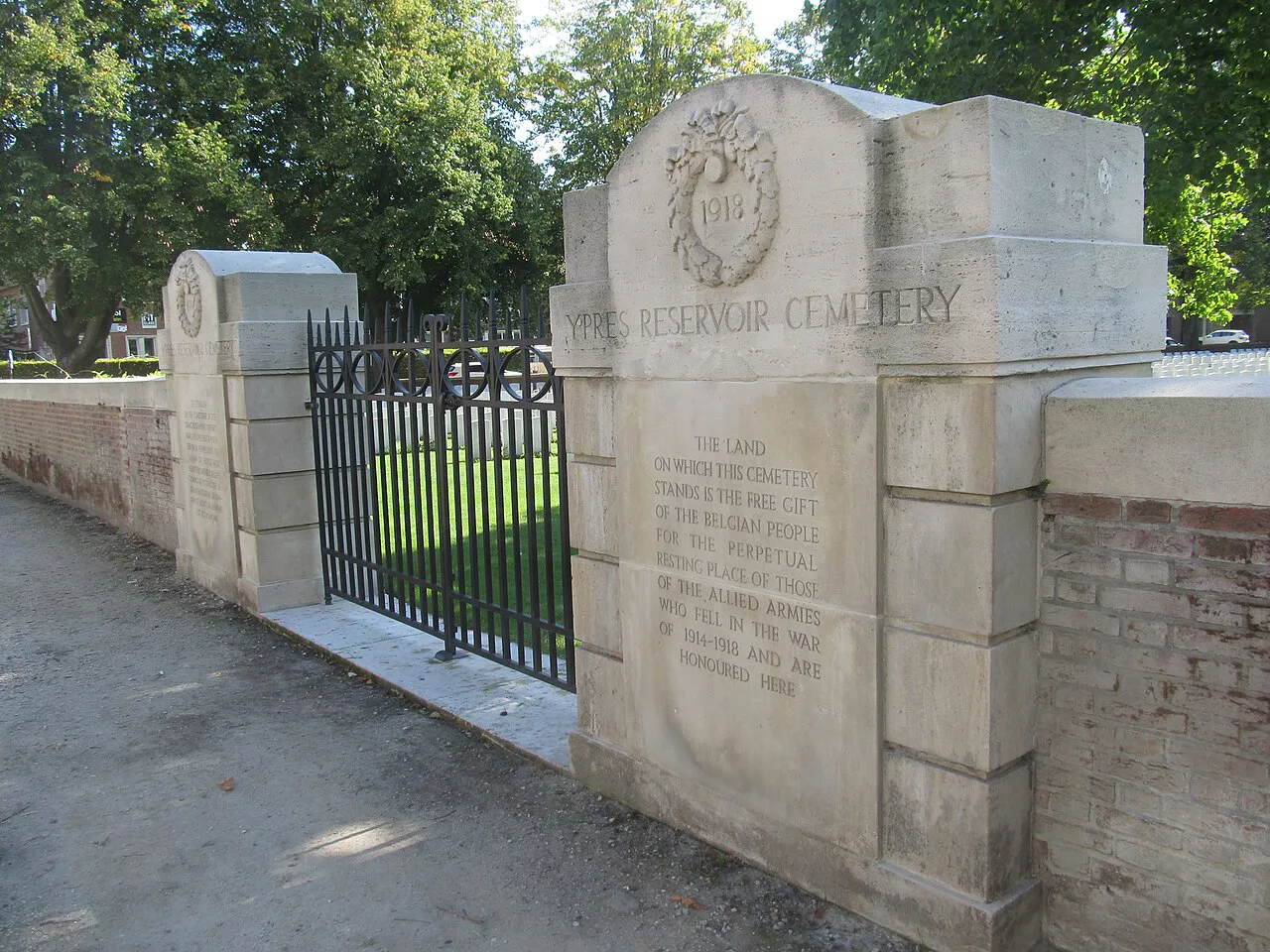 The inscribed entrance pillar of Ypres Reservoir Cemetery.